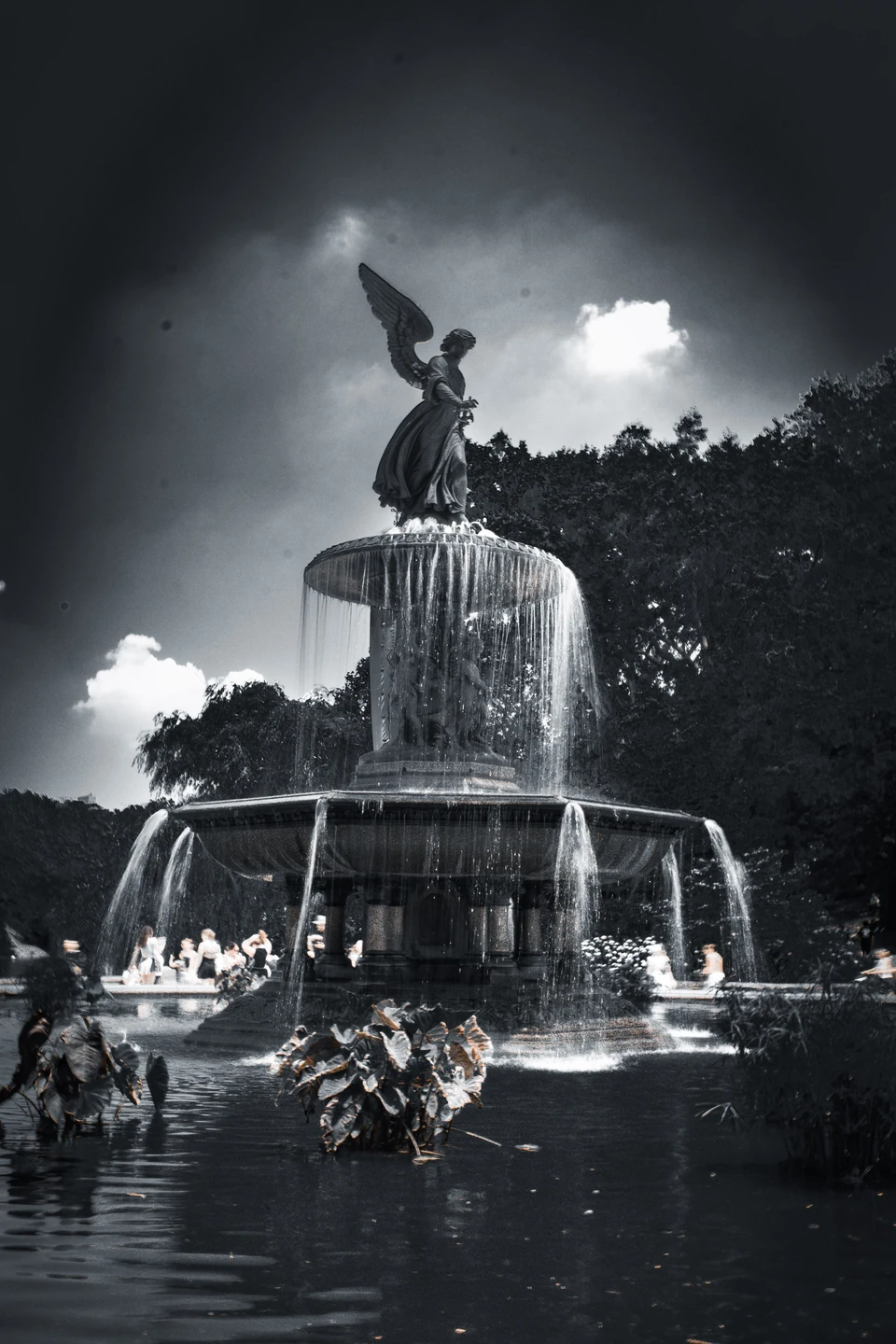 Black and white view of the Bethesda Fountain in Central Park with its winged angel statue
